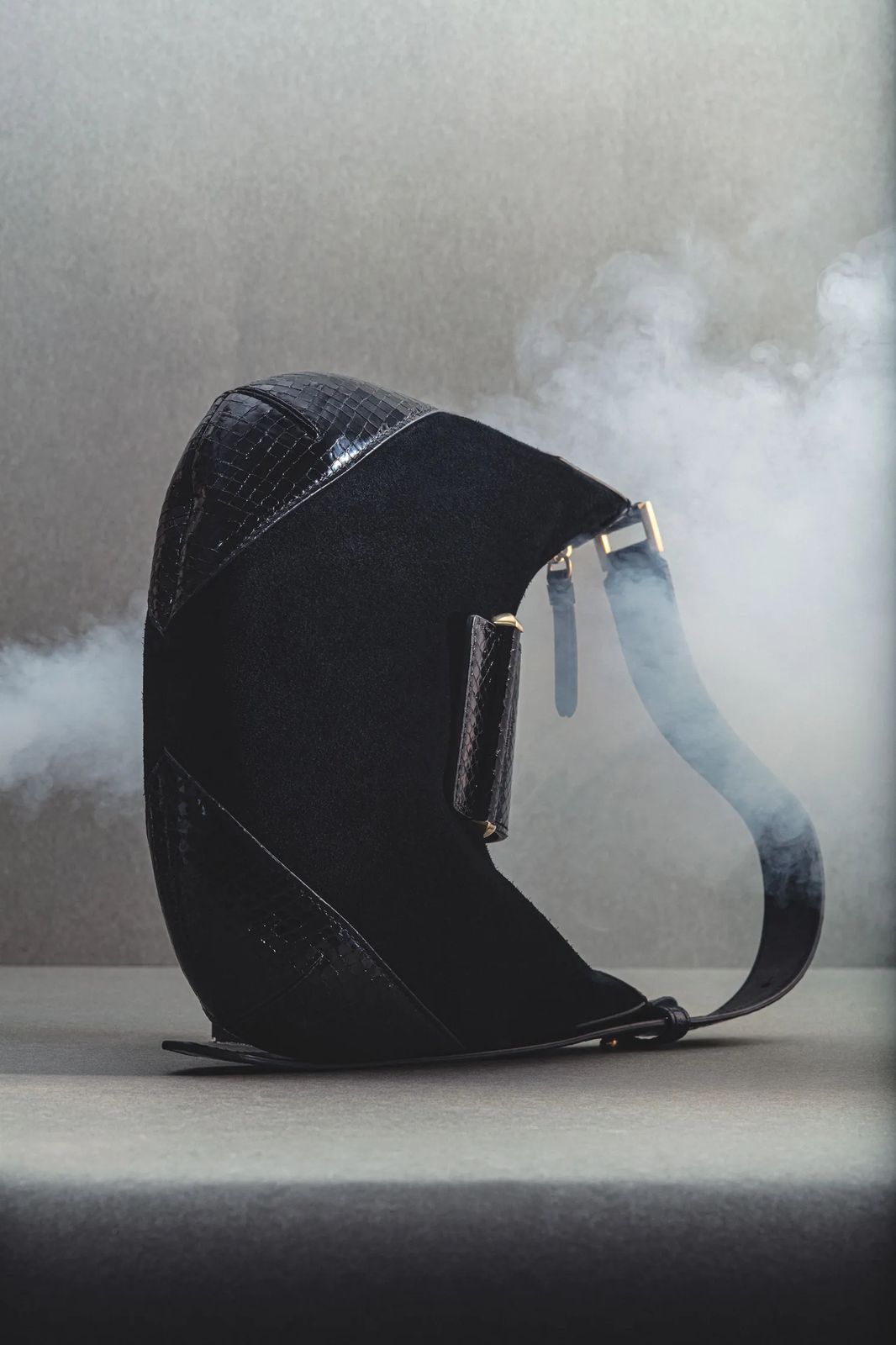 Snakeskin emerging from smoke
