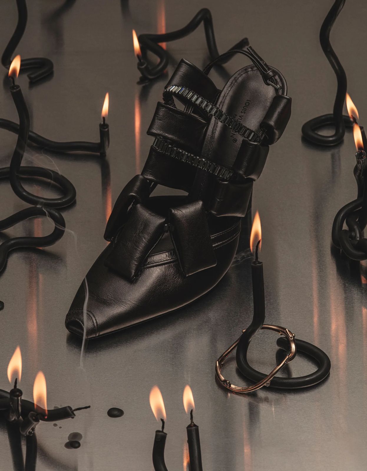 Heel among candles